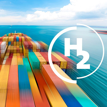 Shipping container barge on water with H2 hydrogen symbol