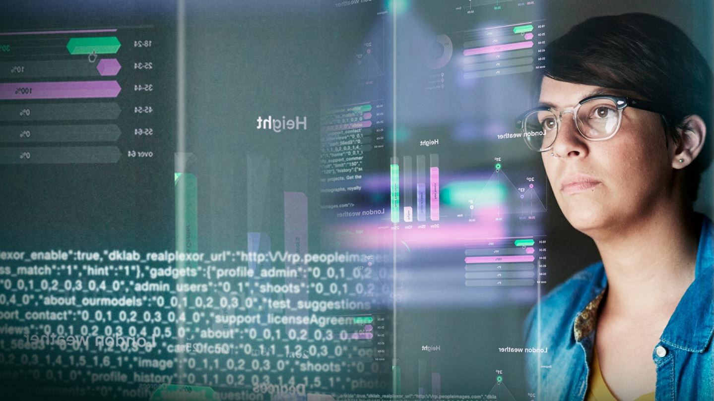 Woman looking at computer data
