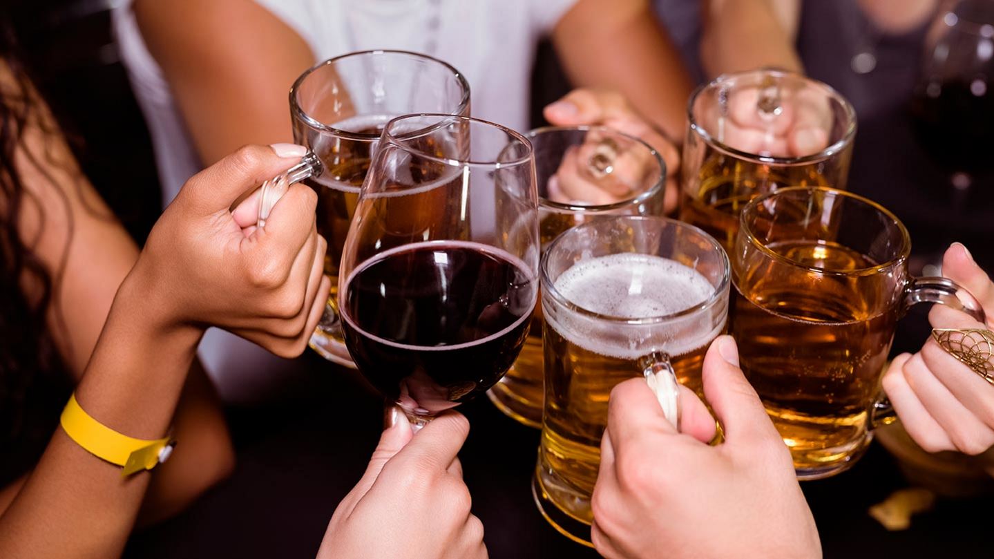 Friends toasting with beer