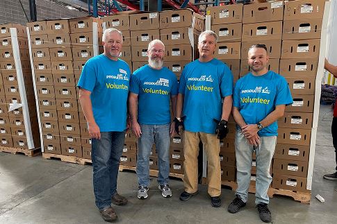 Air Products volunteers package food boxes at the Greater Baton Rouge Food Bank