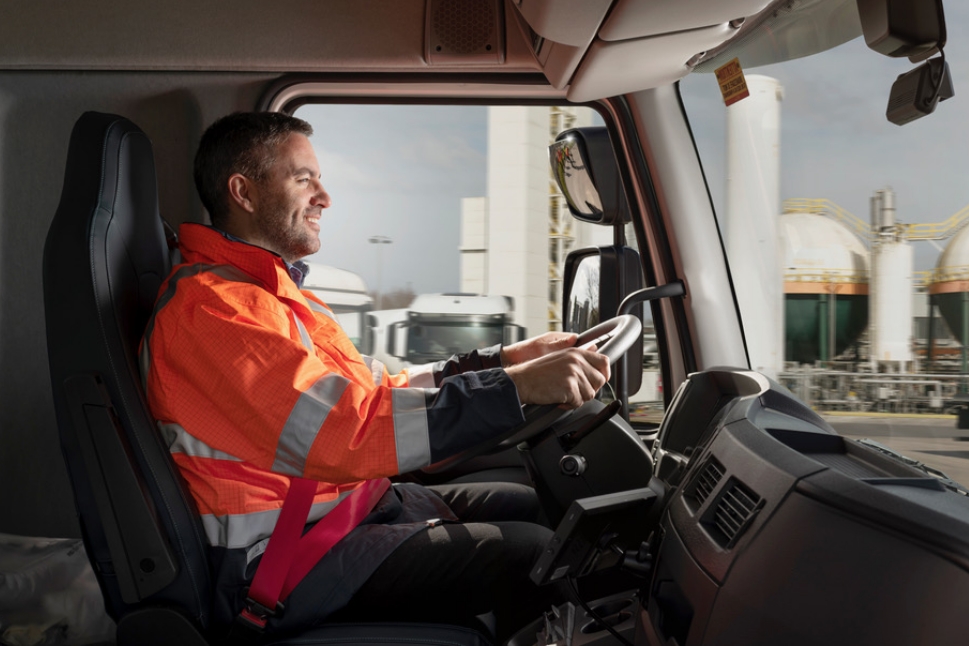 Truck driver sitting in tractor cab