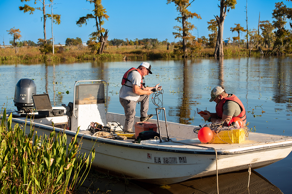 Boat and fishermen on Lake Maurepas in Louisiana